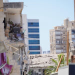 Bat yam Israel , 06.18.2025 - Aftermath of Ballistic Missile Strike . documenting the aftermath of an Iranian ballistic missile strike . The images capture structural damage to residential buildings