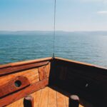View from the front of boat, sailing across the Sea of Galilee